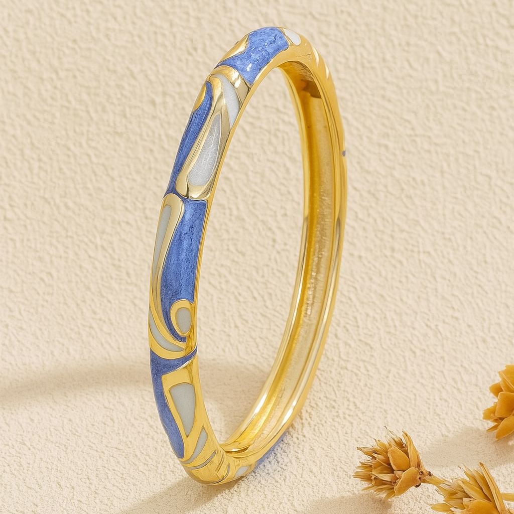 Blue and gold bracelet in a 'HER TREASURE' box on a beige background