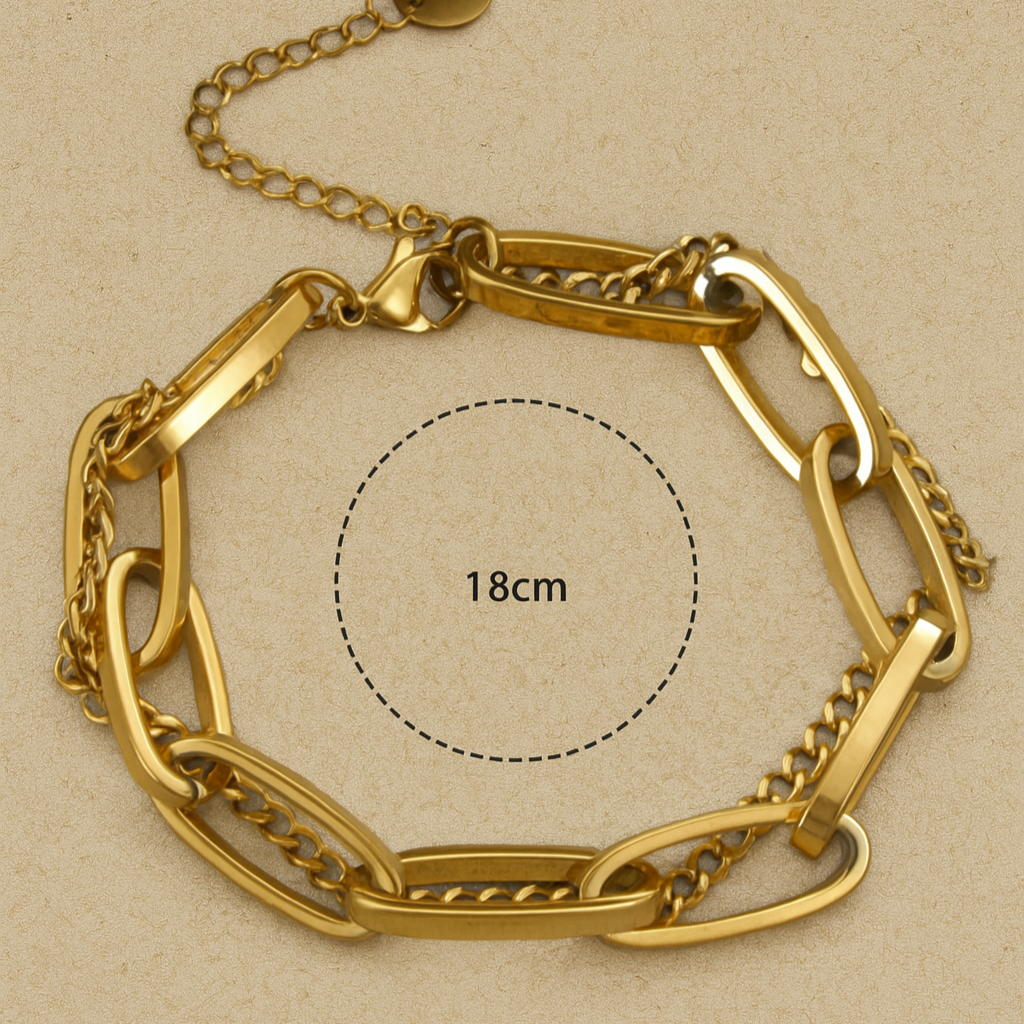 Gold chain bracelet on a beige background with measurement label